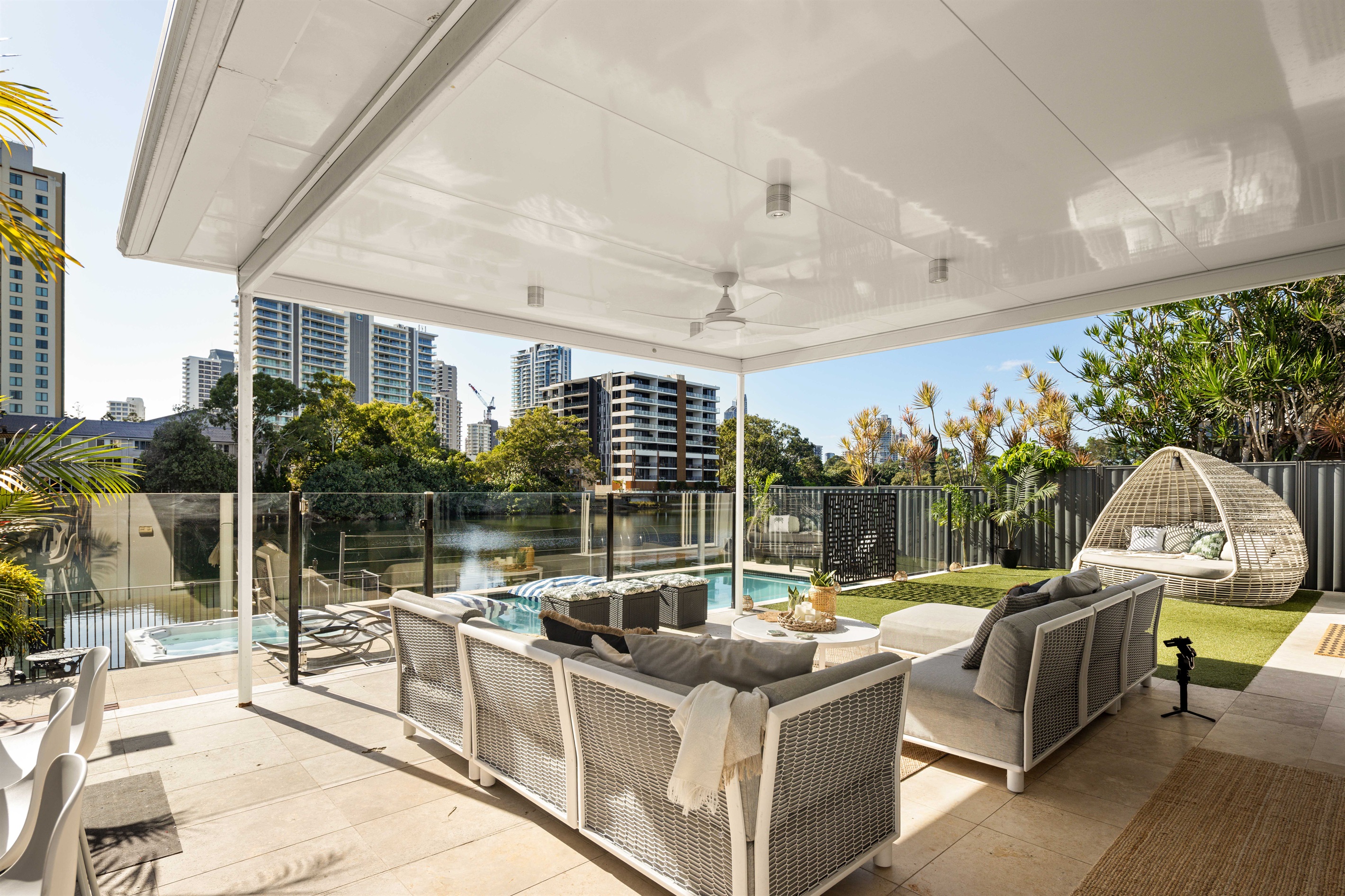 Expansive covered outdoor entertaining with canal views - ideal for long lunches and evening gatherings.