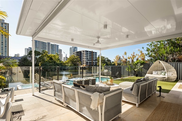 Expansive covered outdoor entertaining with canal views - ideal for long lunches and evening gatherings.