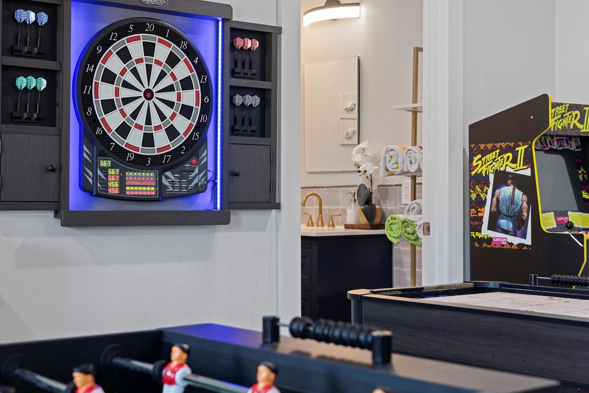 The kids' room's equipped with an arcade, a dartboard, a foosball table, and a shuffleboard, for the complete fun experience.