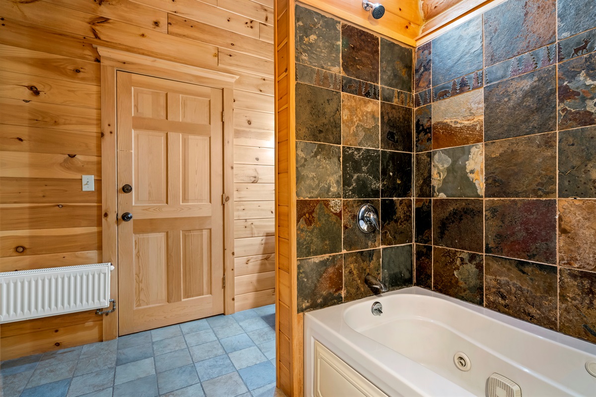 Private master ensuite with full bath amenities