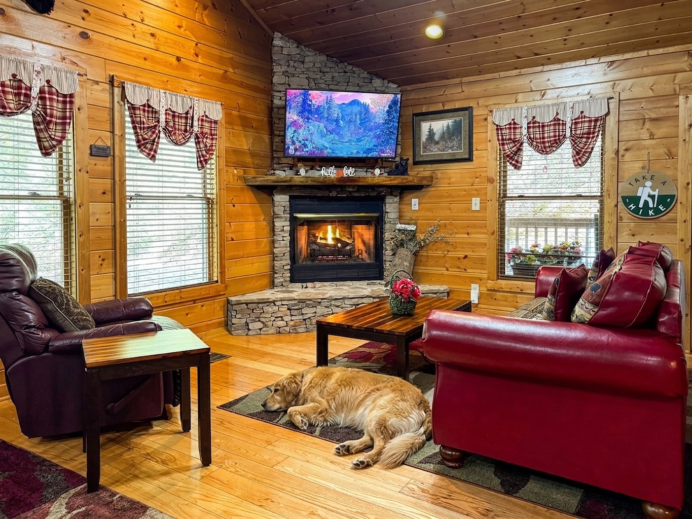 Cozy up by the stone fireplace, available Oct 1 to Mar 31. The perfect spot to relax and defrost after a day of hiking in the National Park.