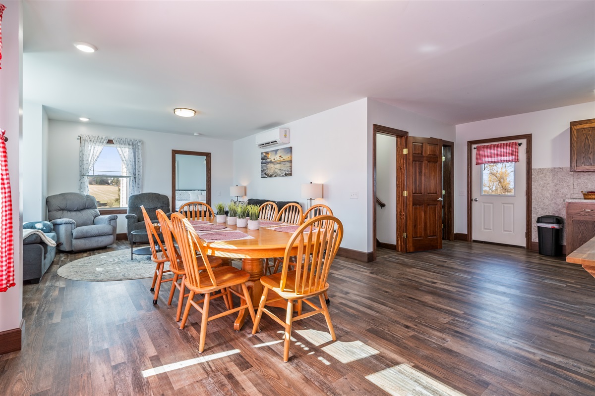 Open-concept kitchen and dining area designed for connection, conversation, and comfort