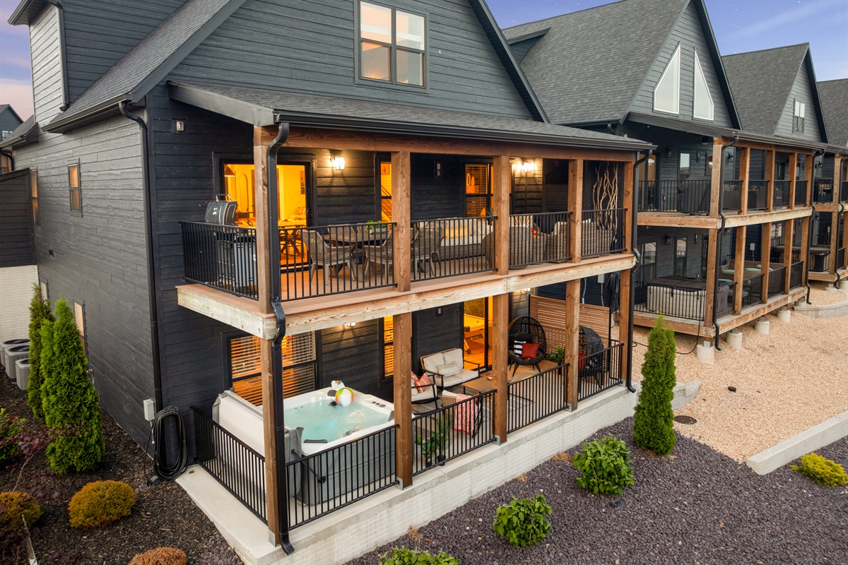 Now let's step out onto the main level deck with dining and sitting areas for gathering and relaxing