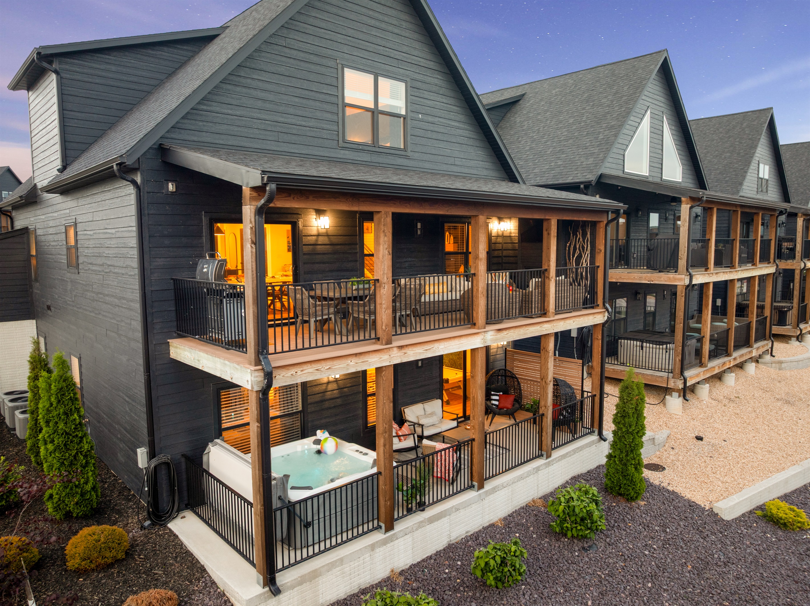 Now let's step out onto the main level deck with dining and sitting areas for gathering and relaxing