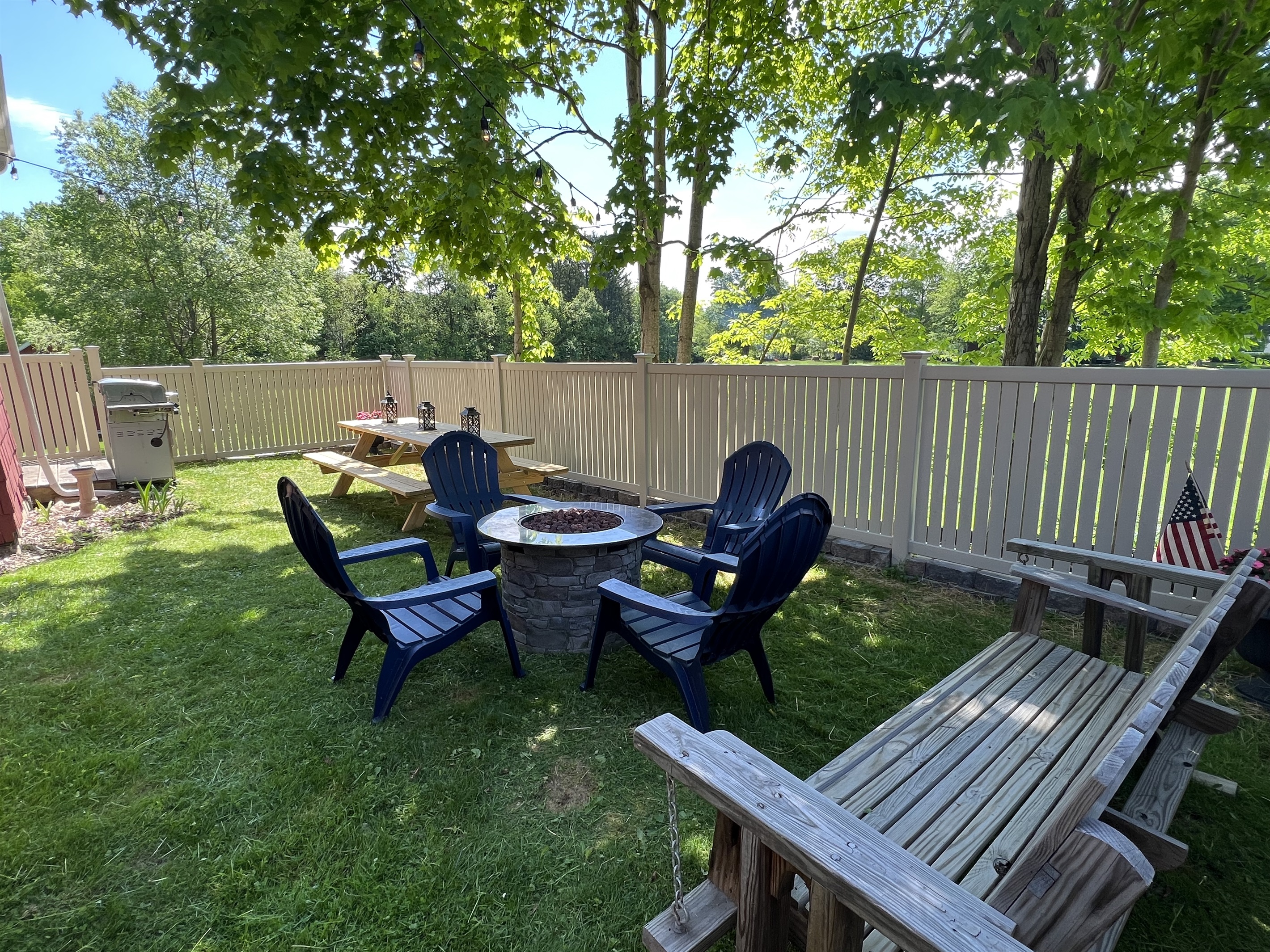 Backyard w/ gas grill and fire pit