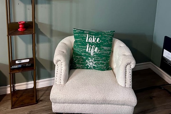 Accent chair with matching ottoman for a small spot to sit back and relax.
