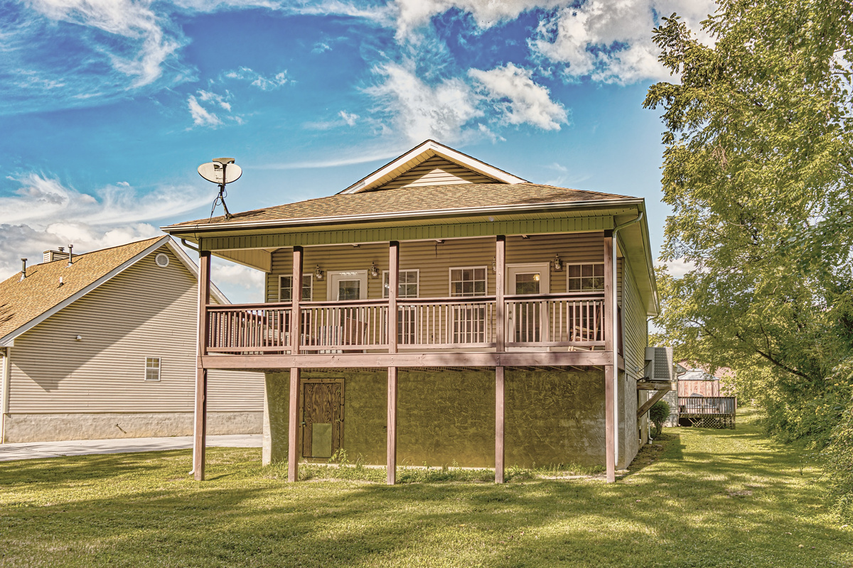 Back of the house in Pigeon Forge, a few blocks from the Parkway facing the creek.