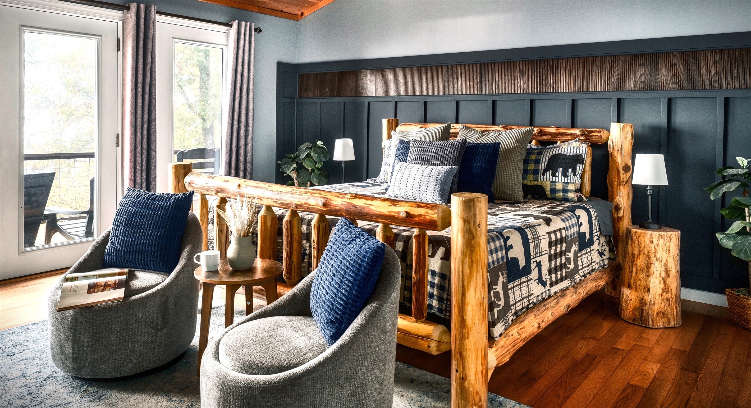 Wake up each morning to stunning mountain views right from your bed. The main-floor master bedroom offers an electric fireplace for added comfort and floor-to-ceiling glass doors and windows that bring the outdoors right to you.