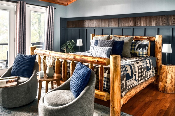 Wake up each morning to stunning mountain views right from your bed. The main-floor master bedroom offers an electric fireplace for added comfort and floor-to-ceiling glass doors and windows that bring the outdoors right to you.