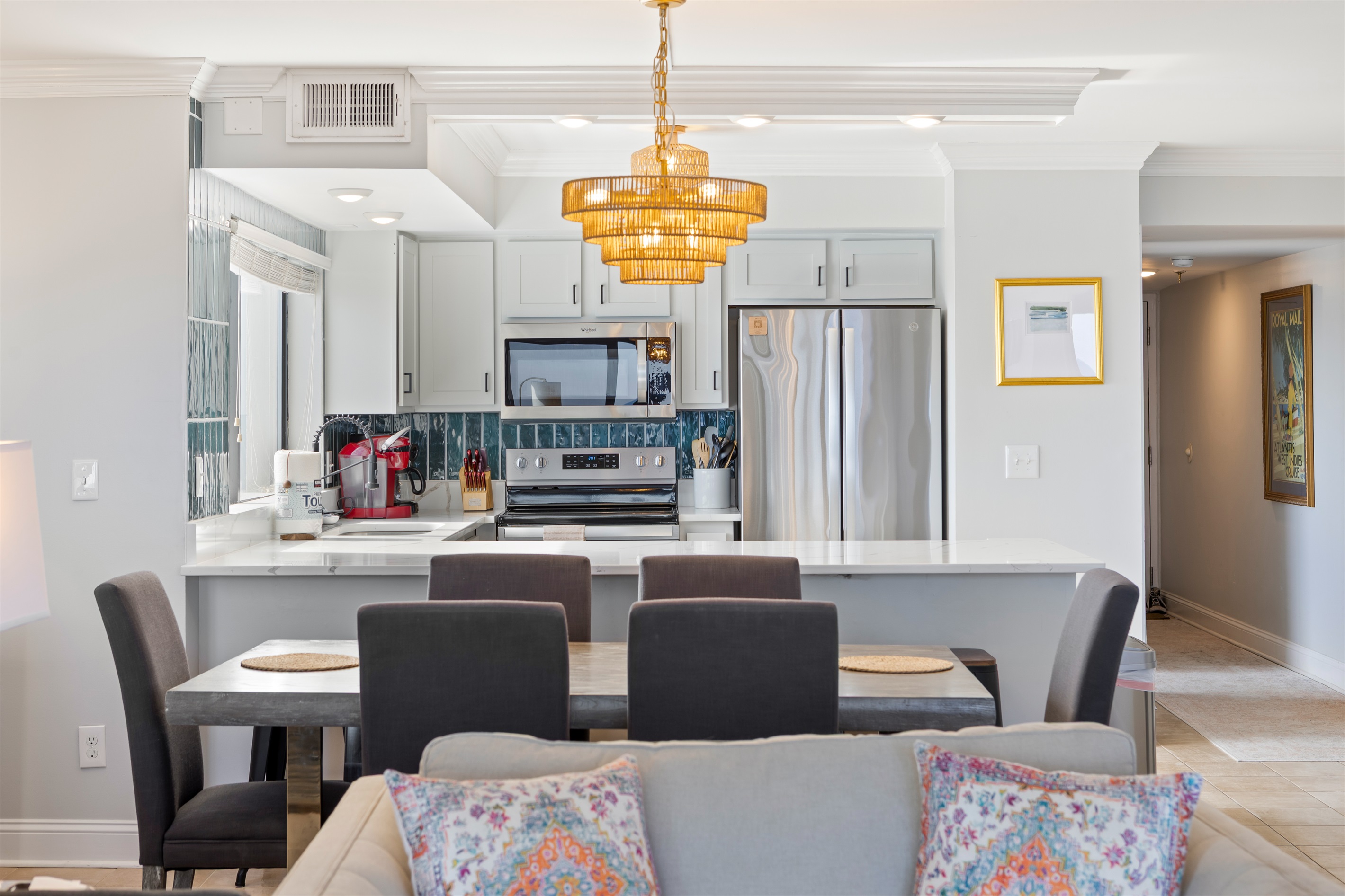 Full sized kitchen with bar seating for four