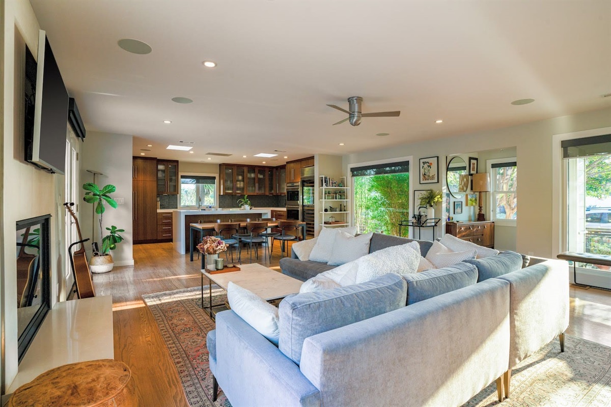 Living area with smart tv and fireplace.