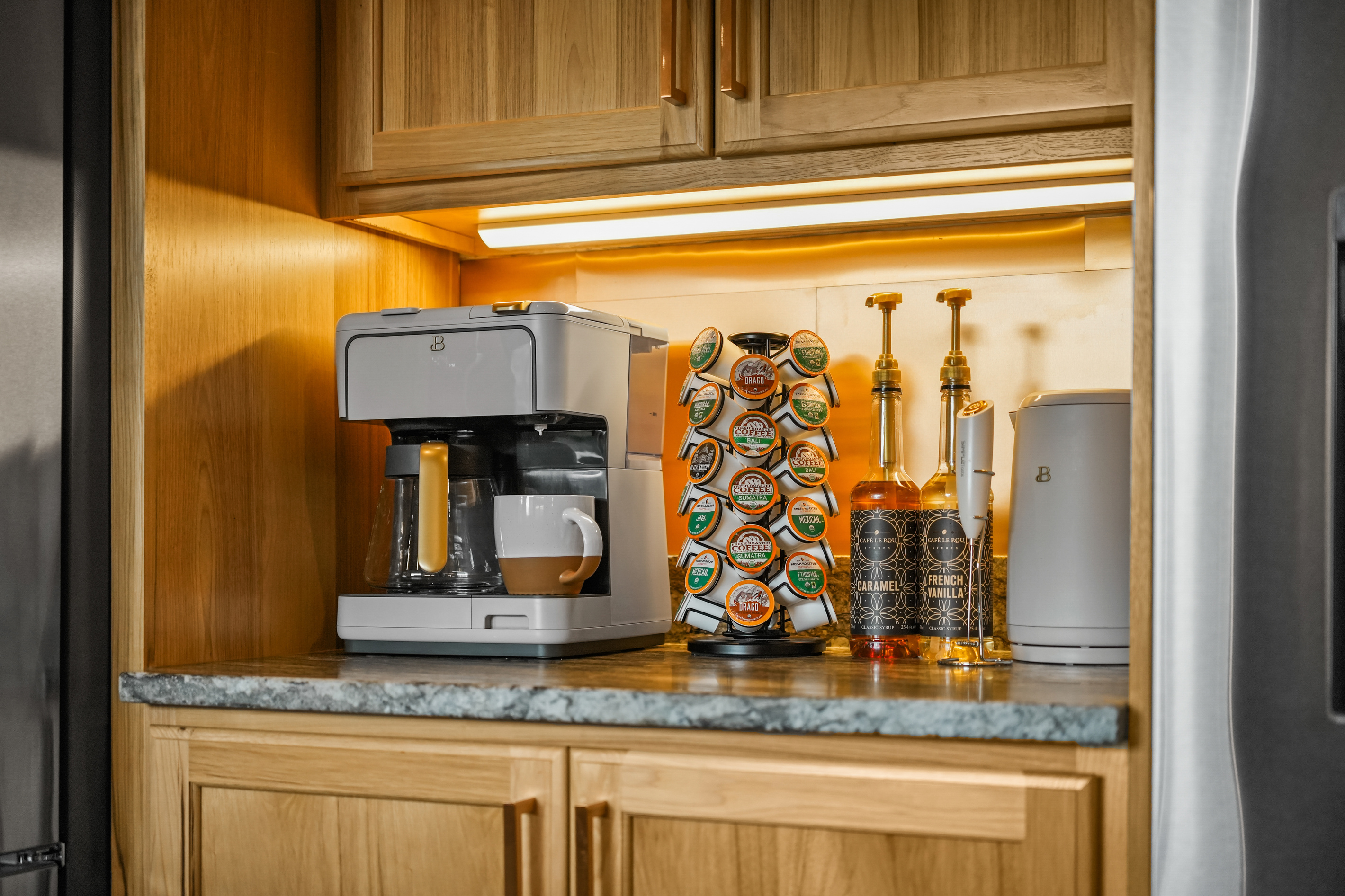 Start your day right with the Coffee Bar - single cup or a pot for the group. Comes with organic coffee pods, real cane sugar flavored syrups and a frother. 
