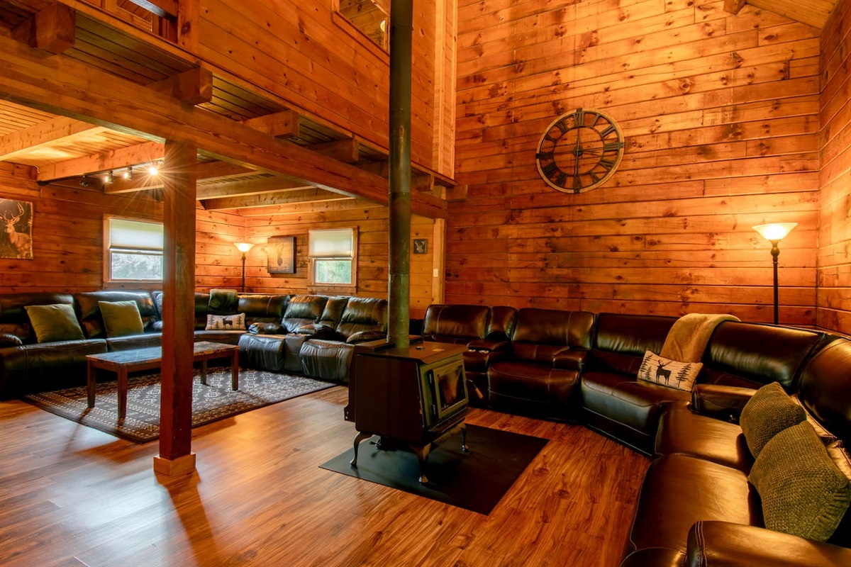 Put up your feet and relax on the electric reclining sectionals by the wood burning stove. Ask host if outdoor temperatures would be conducive to using the wood burning stove during your stay.