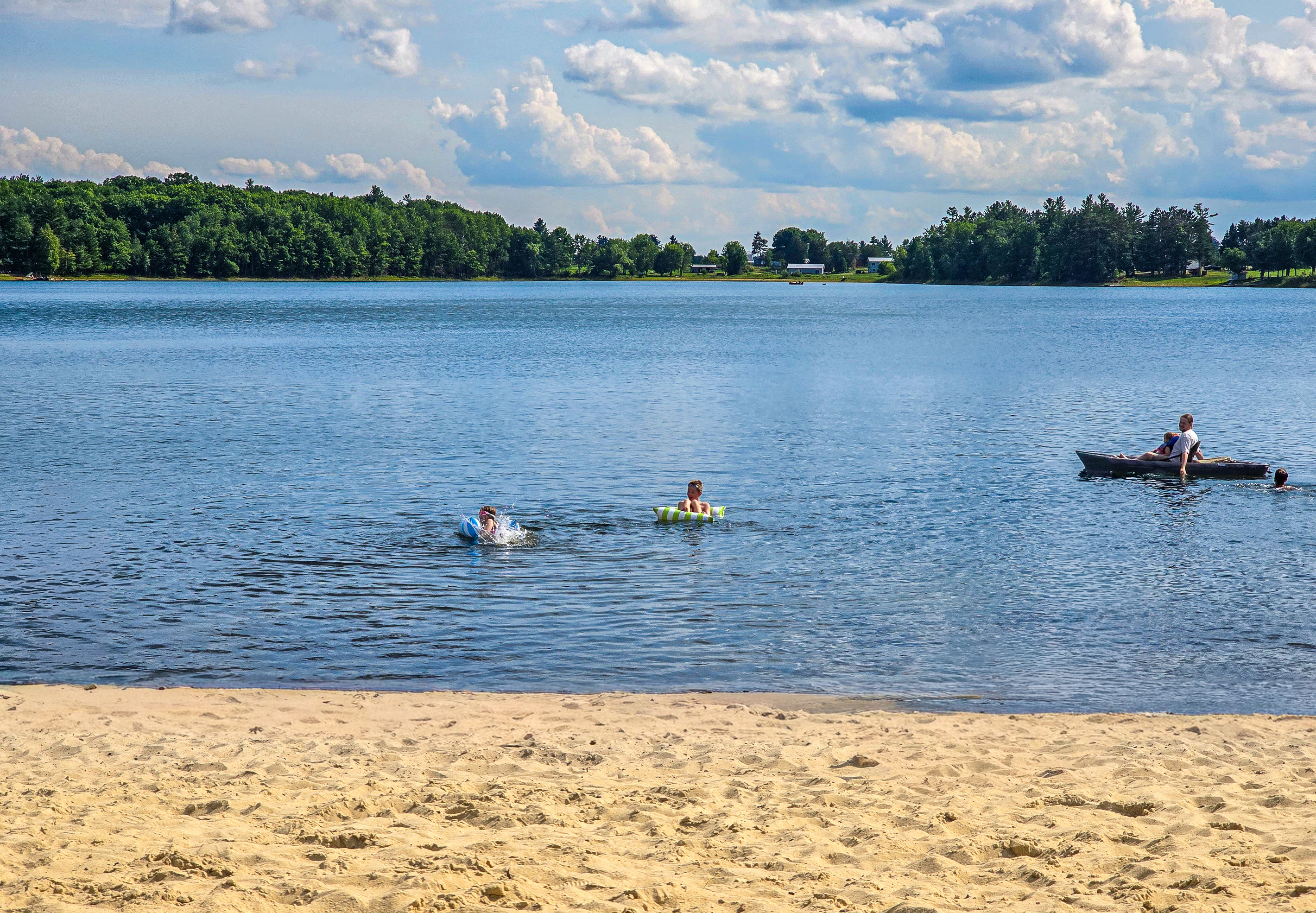 Kids can wade at the Windfall Beach, 0.3 miles from the lakehouse
