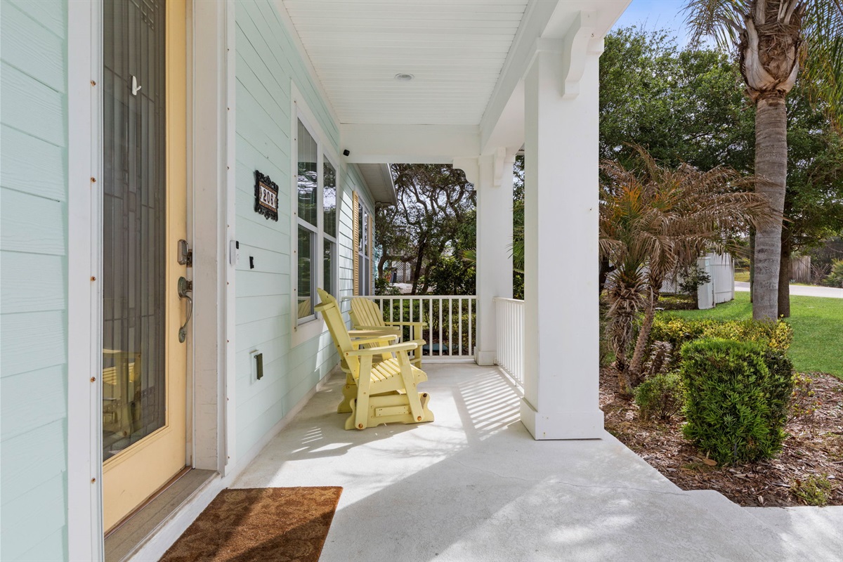 Start the morning in the yellow rockers with coffee and birdsong, come home to the porch after the beach, and let the quiet breeze remind you that the best vacations begin with a place that feels welcoming from the very first step.