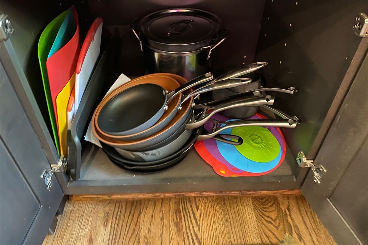 Pots and pans along w/skillets to cook with and cutting boards.