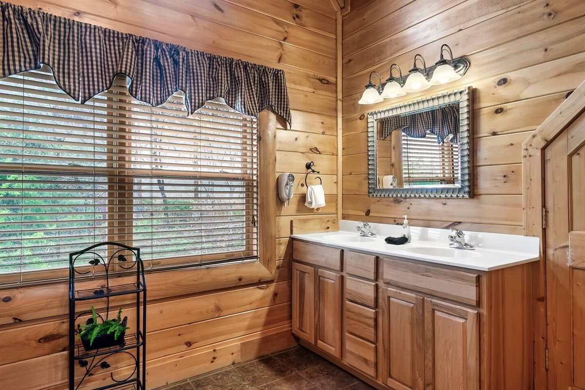 Upstairs master bathroom with double sinks.