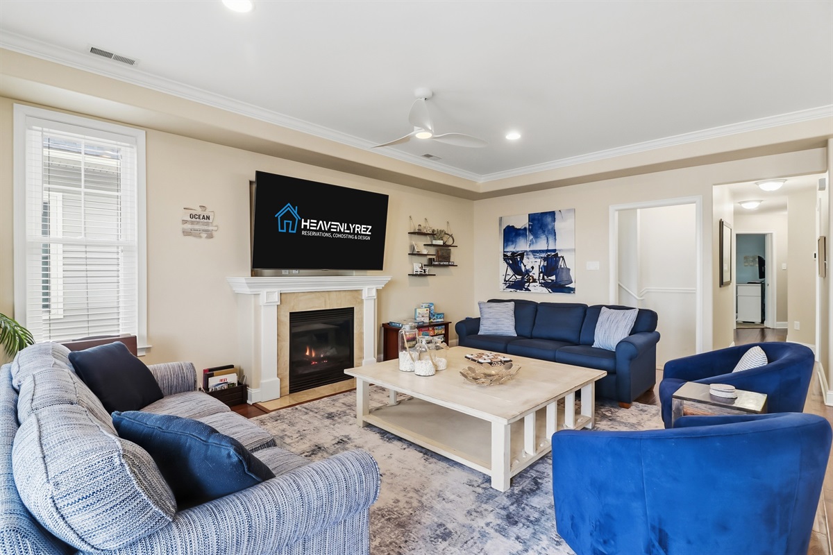 Cozy family room with fireplace and games
