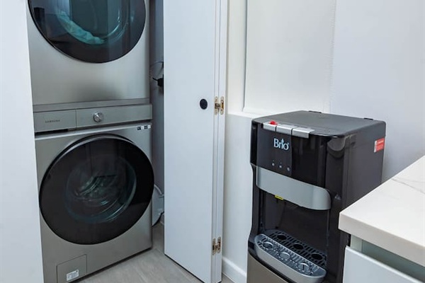 En suite washer and dryer and filtered water cooler.