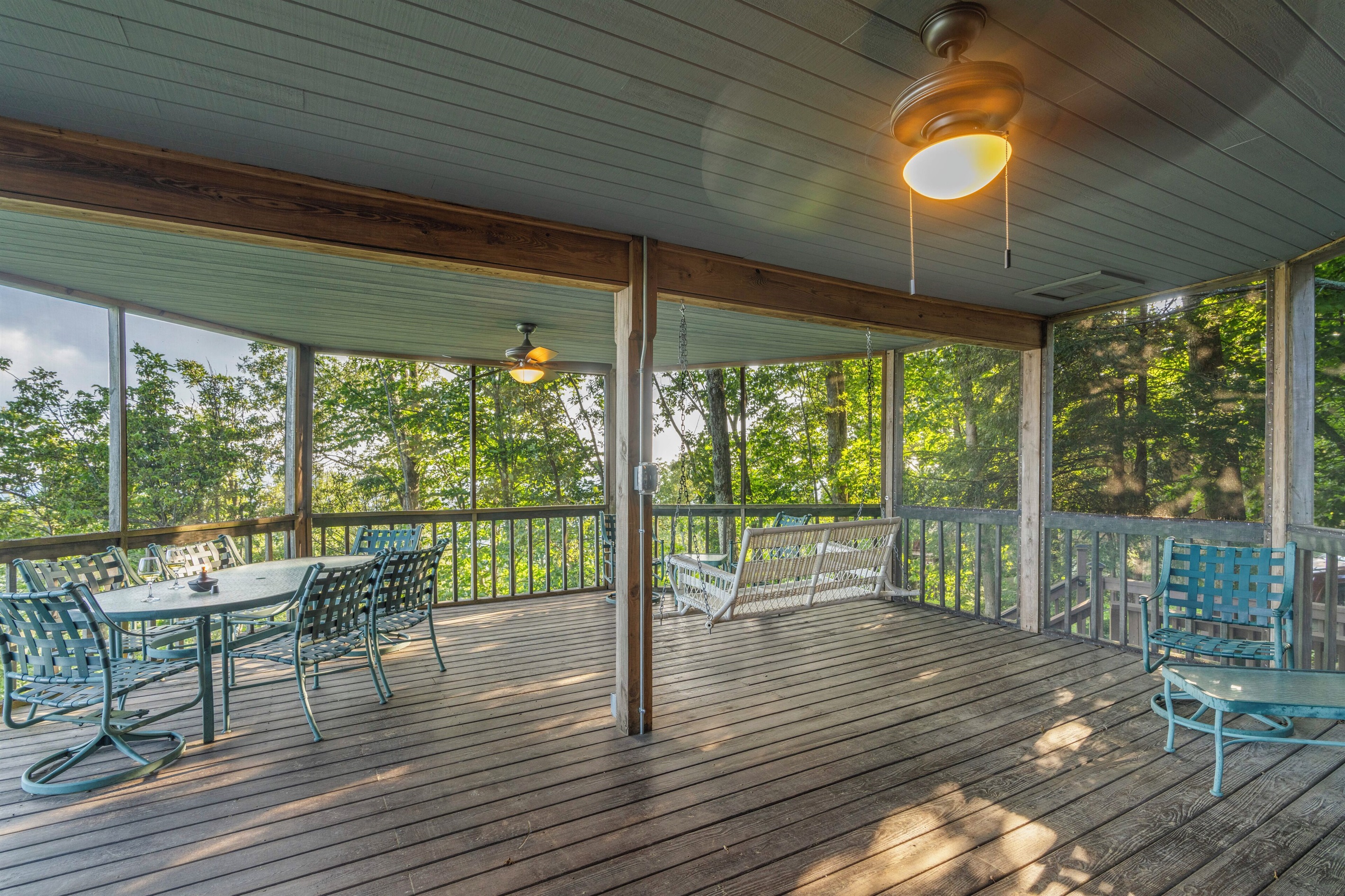 Screened in porch on lower deck
