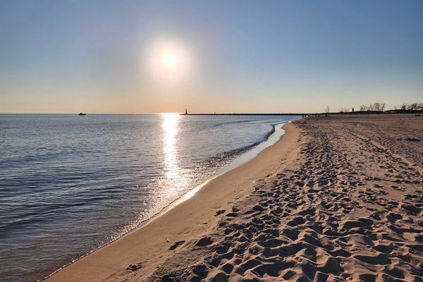 Pere Marquette Beach just minutes from the home offers soft sands, clear water, and unforgettable sunsets