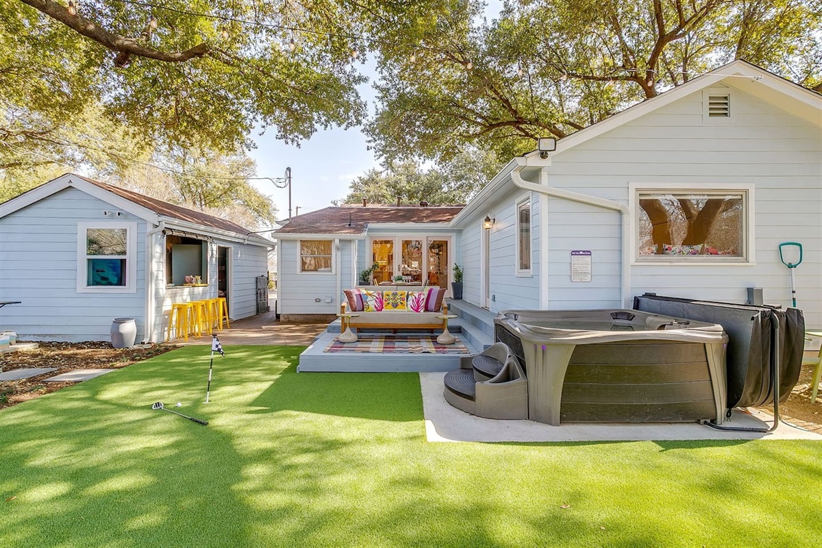 Hot tub positioned just off the main deck