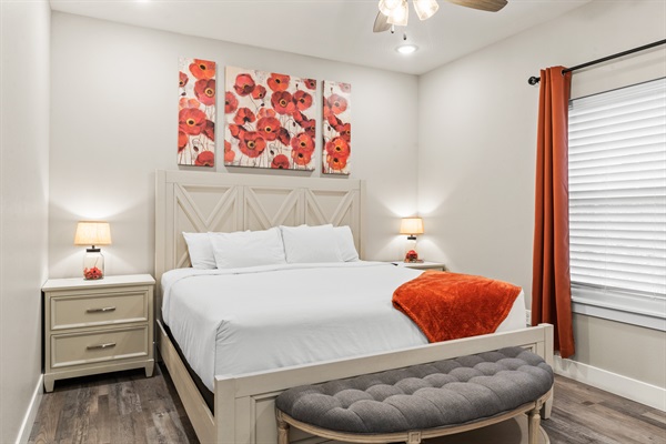 Master Bedroom #2 has a king size bed, dresser, TV and large closet.