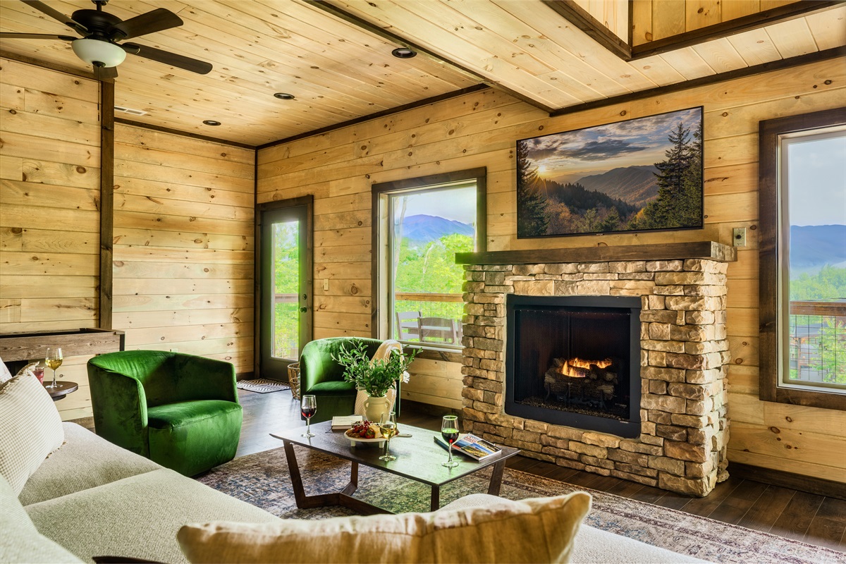 Indulge in the warmth of the gas fireplace while enjoying your favorite shows on the 60" smart TV