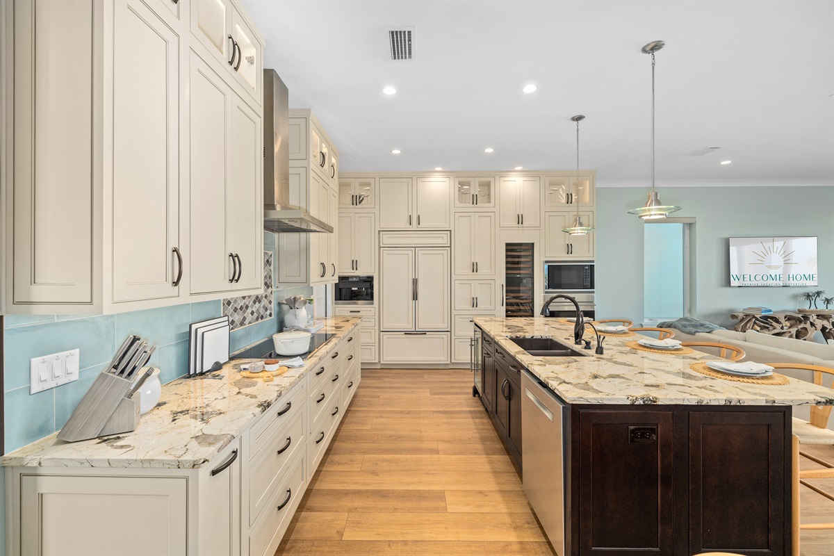 Fully stocked chef's kitchen with modern appliances and ample counter space