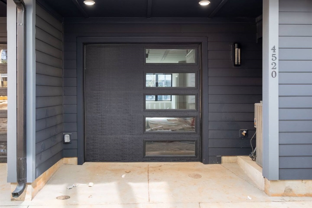 2 car garage (for smaller vehicles) with complimentary parking. There is also free street parking available right outside the community. Less than 1 minute walk to the townhome from street parking.