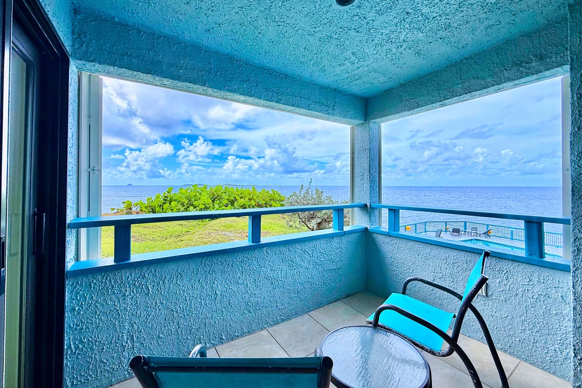 Walk from your bedroom to the balcony that have open views of the sea and the pool