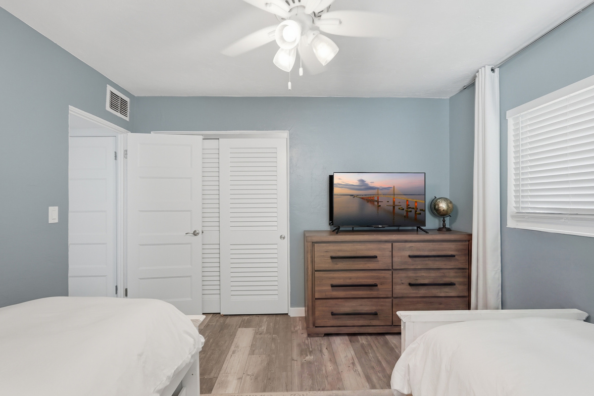Cozy and inviting, the guest bedroom provides a comfortable space for family or friends to relax and enjoy a restful night's sleep.