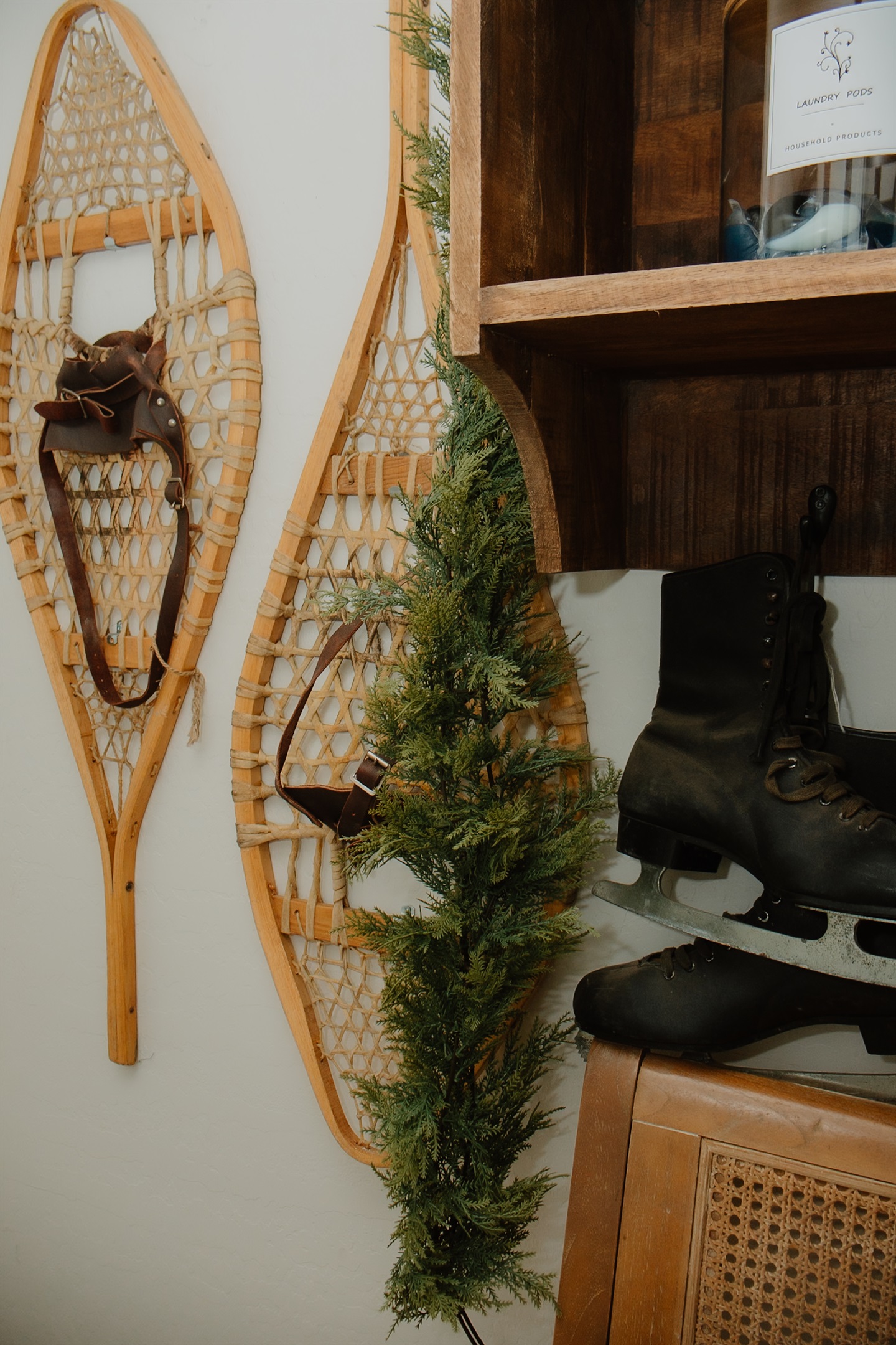 Vintage snowshoe decor and pine garland bring authentic White Mountains charm to this Pinetop vacation rental. Complimentary starter laundry pods provided for your convenience near Sunrise Ski Resort in Arizona's mountain country.