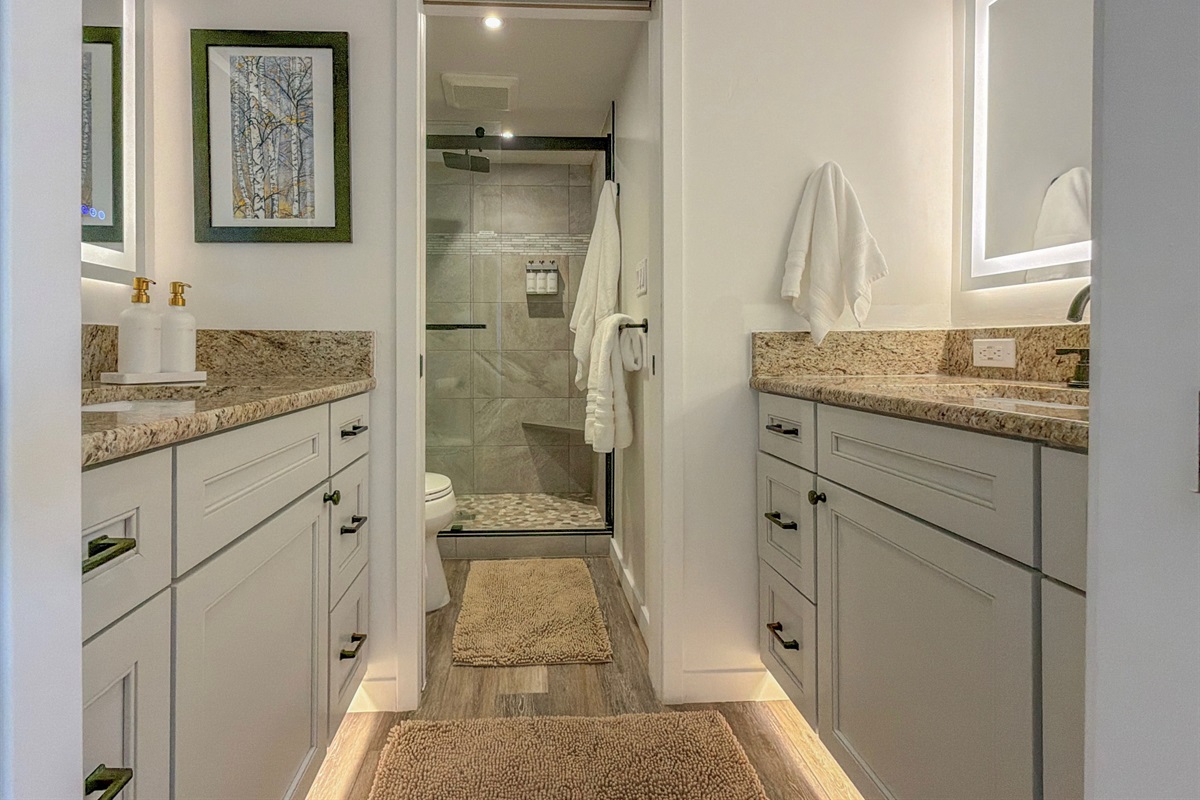 Dual vanities and LED mirrors mean no fighting for counter space. Get ready together - no rush or compromises - your dinner reservation in Aspen awaits.
