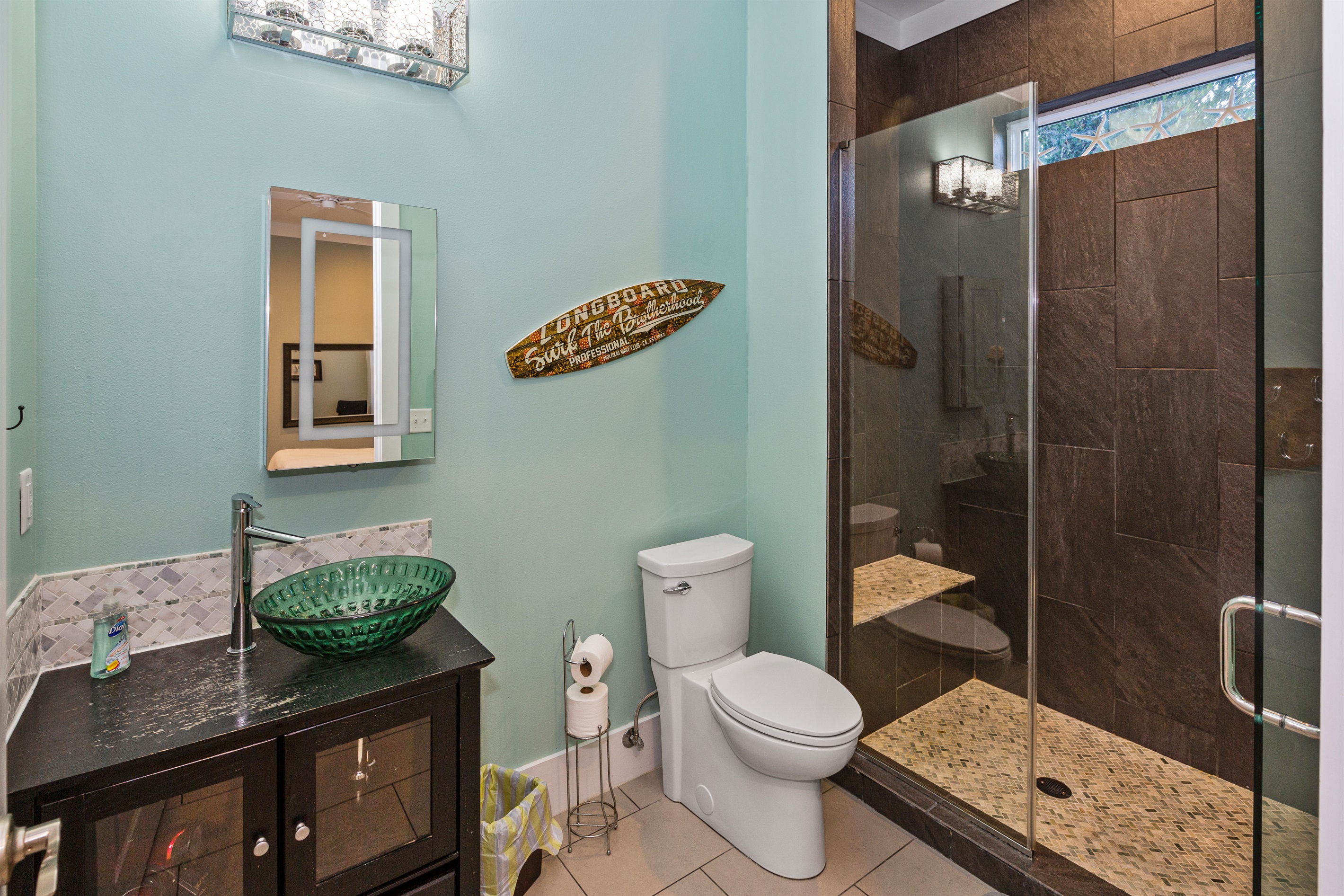 Modern first floor private bath attached to second king suite.