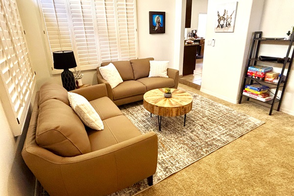 Game room with lounge area, pub seating, pool table, board games for the whole family