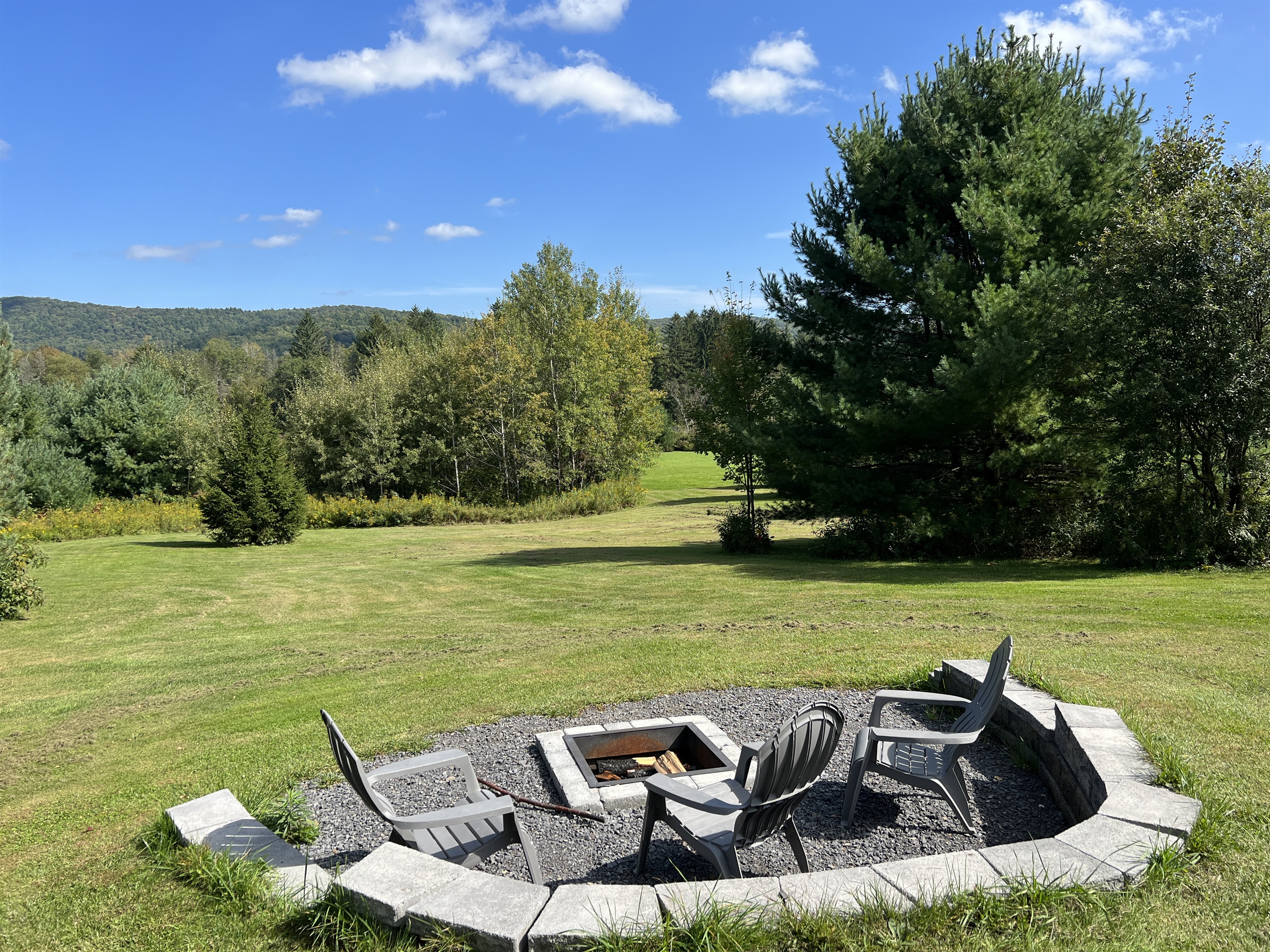 Fire Pit overlooking the large backyard.