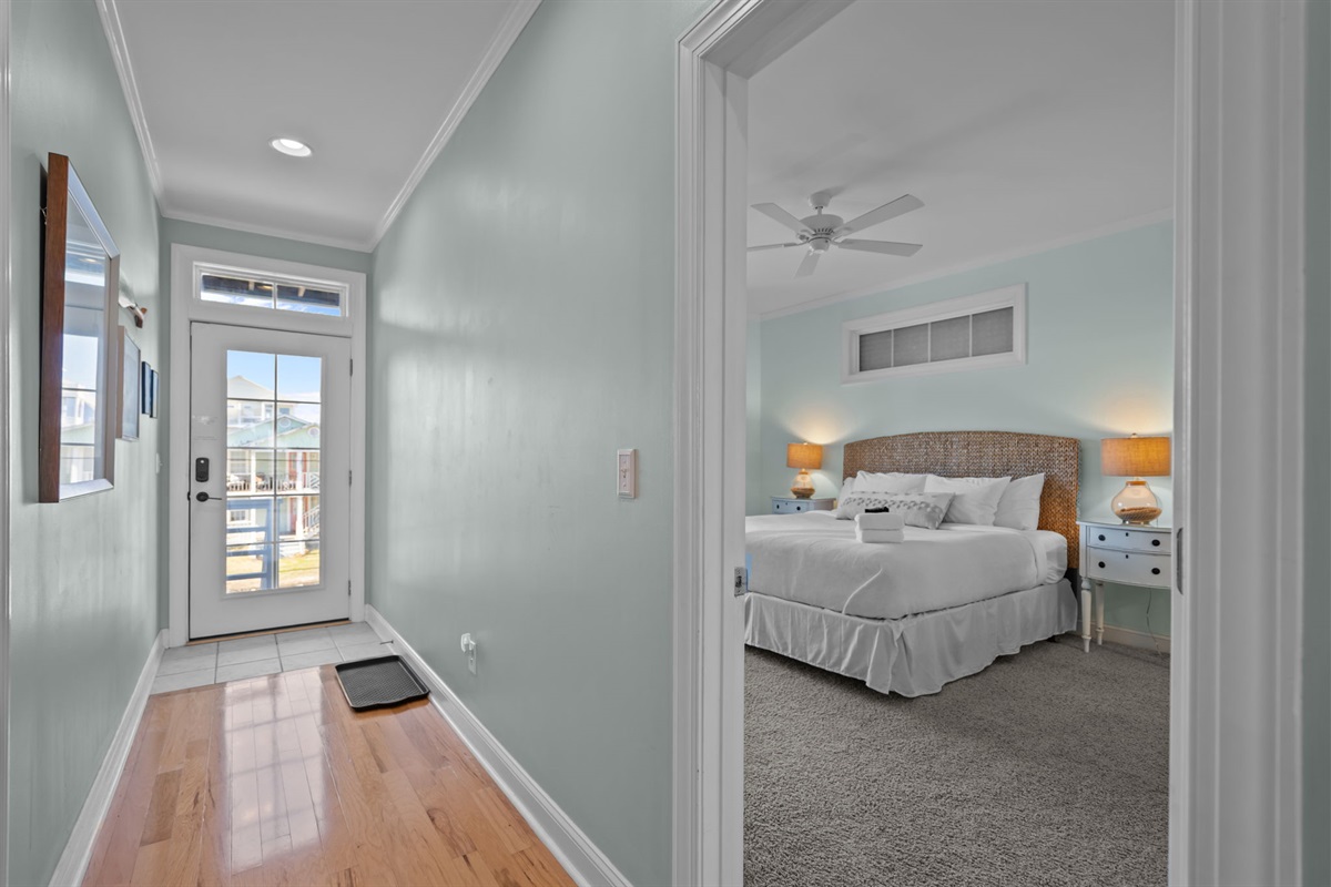 1st floor bedroom 1 (master): king bed sleeps 2 with deck access and intracoastal water views.