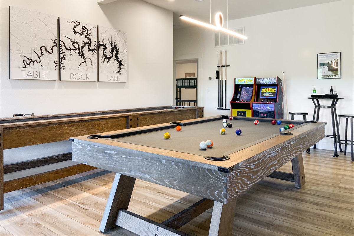 Pool table, shuffleboard, and arcade games