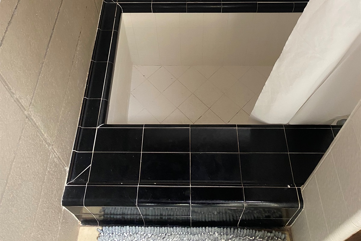 Deep step in to the tub/shower