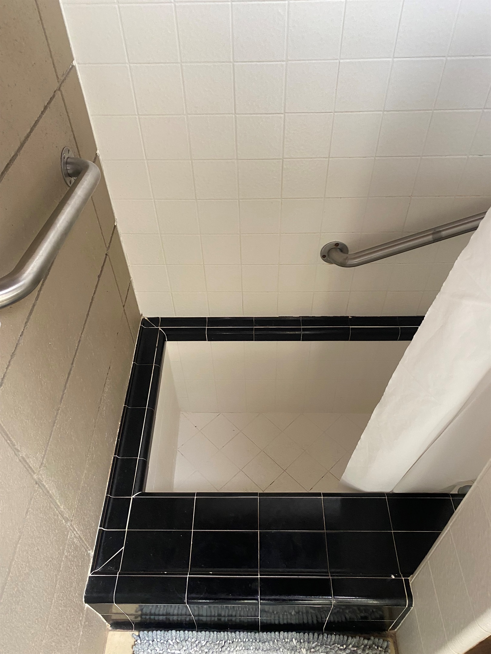 Deep step in to the tub/shower