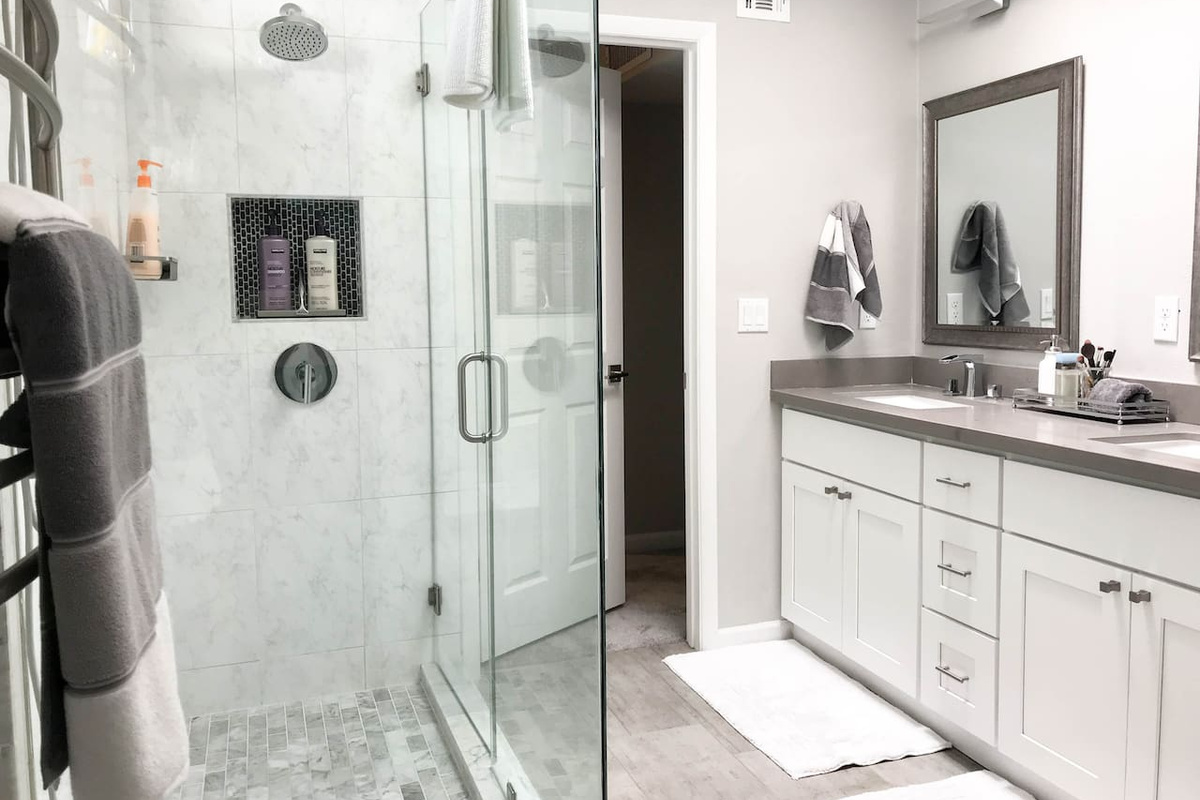 Two sinks and large shower. Plenty of walk around room