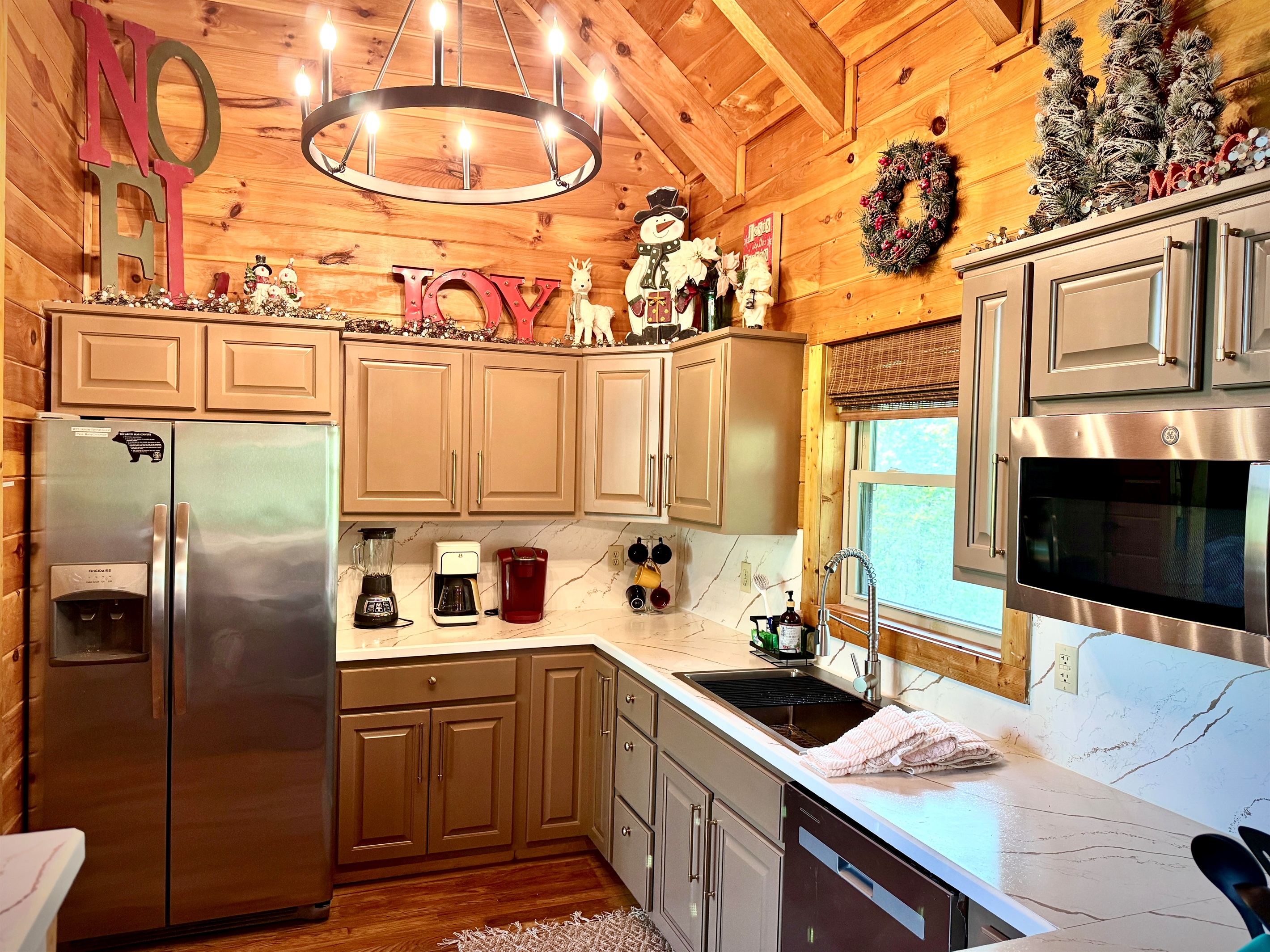 Christmas all year long!  New wagon wheel chandelier.
