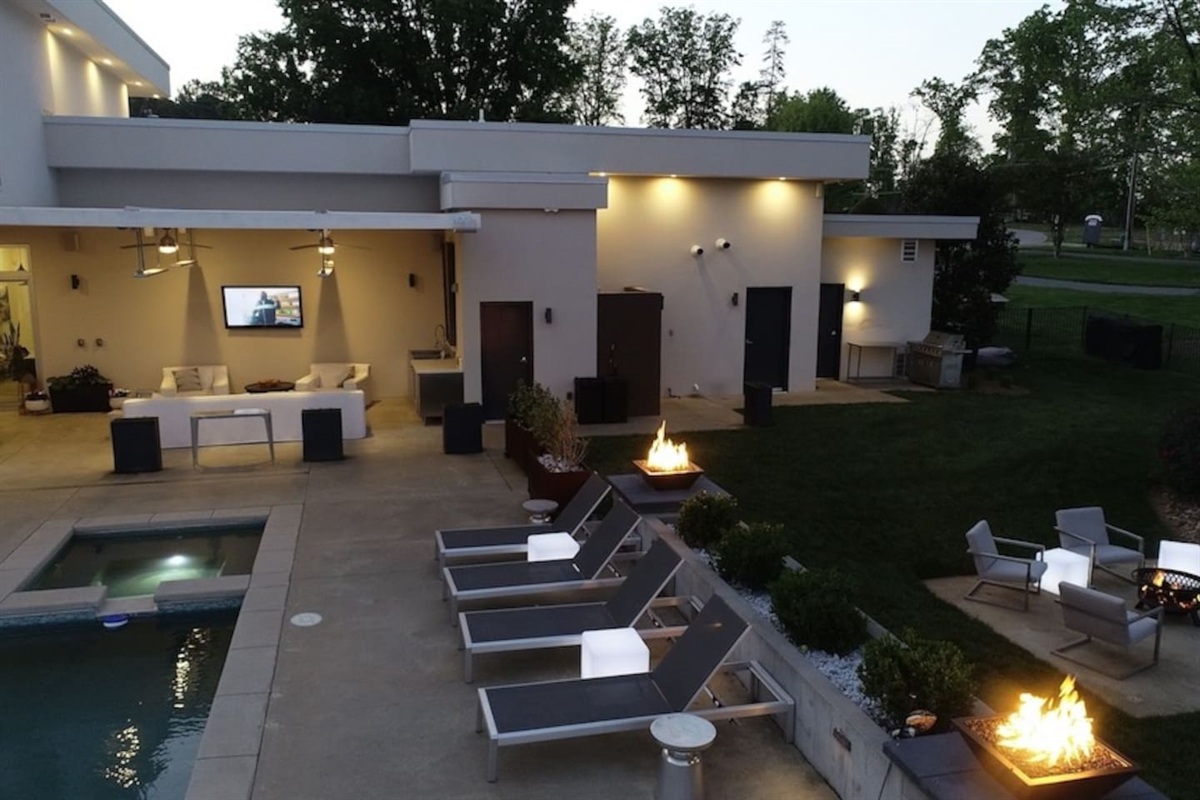 Outdoor tv area with retractable awning