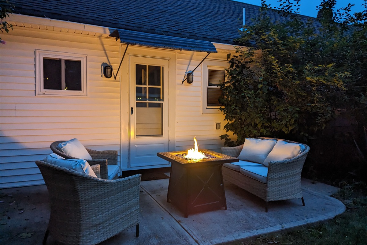 **New Furniture!** Sit back and enjoy the fire pit and outdoor seating