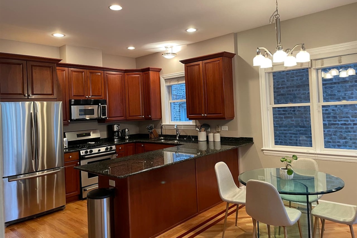Modern kitchen layout with planty of prep space and storage for group stays