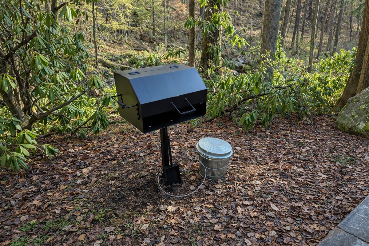 Charcoal grill with relaxing creek views