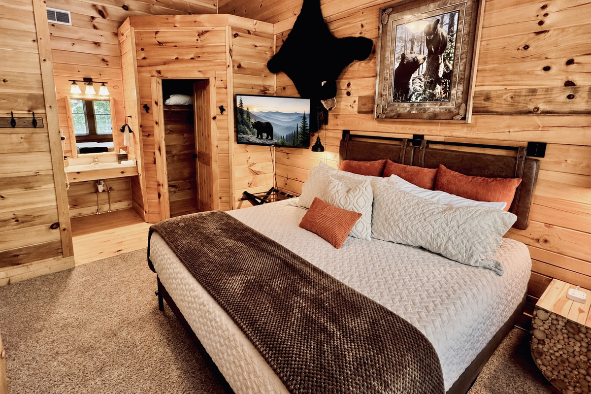 Bedroom 2, Papa Bear Room, upstairs, king and twin bunk, private full bath, tv, dark curtains.