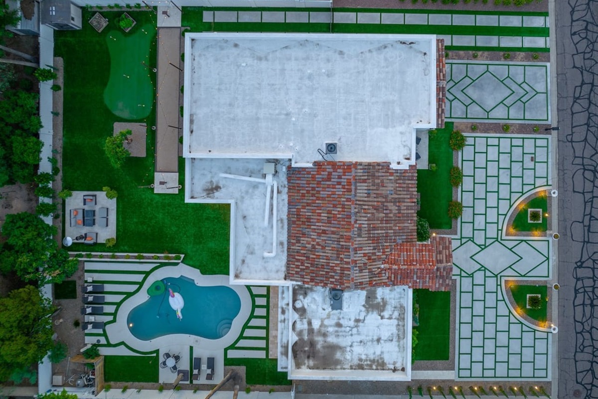 Elevate your experience with this stunning top view! Enjoy the layout of our spacious home and surrounding areas, ideal for your next getaway. See it all from above—your adventure awaits!