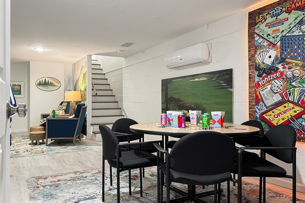 Head downstairs to the game room — Hot Springs Breakaway